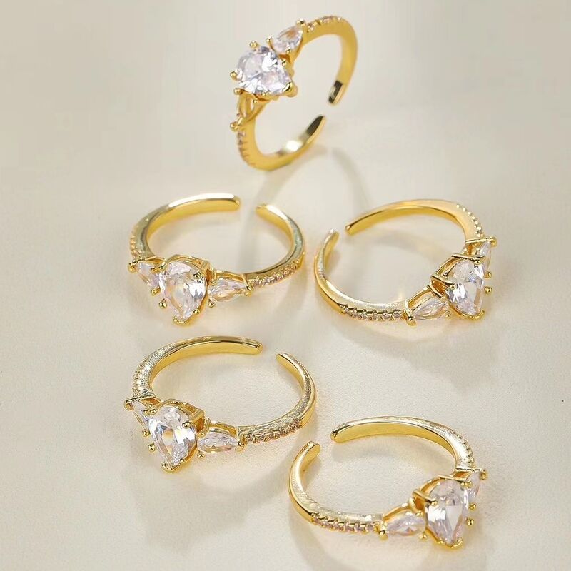 quality Jiexing Trendy Finger Rings Wholesale 14K Gold Plated Adjustable Shinny Zircon Micro Set Drop Shape Opening Ring factory
