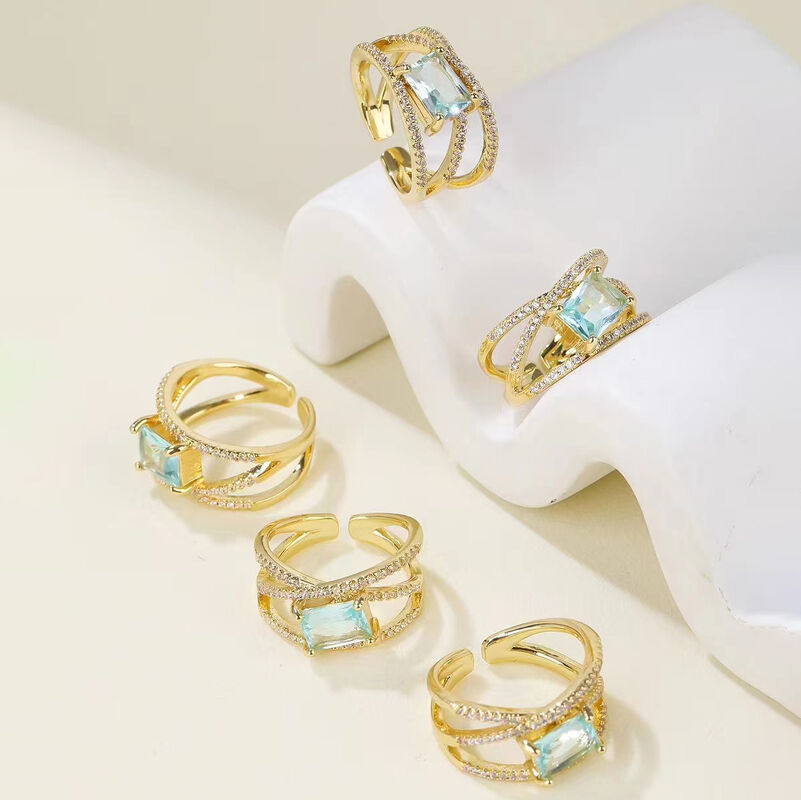 quality Jiexing Trendy Finger Rings 14K Gold Plated Adjustable Blue Hollow Zircon Finger Ring Women Jewelry factory