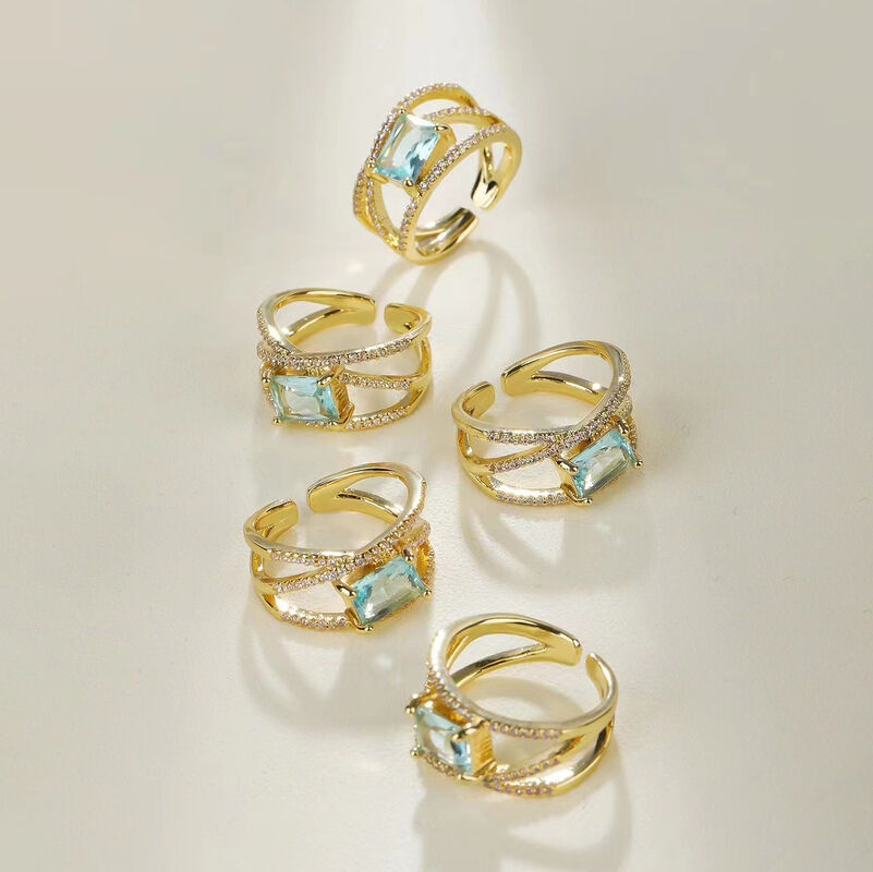 quality Jiexing Trendy Finger Rings 14K Gold Plated Adjustable Blue Hollow Zircon Finger Ring Women Jewelry factory