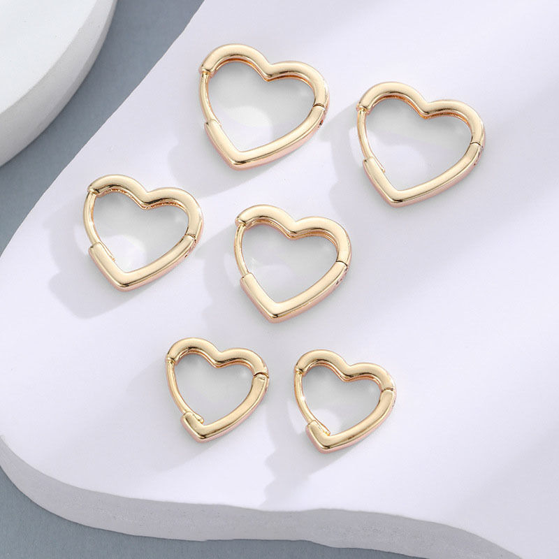 Quality Wholesale Fashion 14K Gold Plated Smooth Heart Shaped Hoop Earrings Jewelry for Women 2026 Minimalist Brass Huggie Earring factory